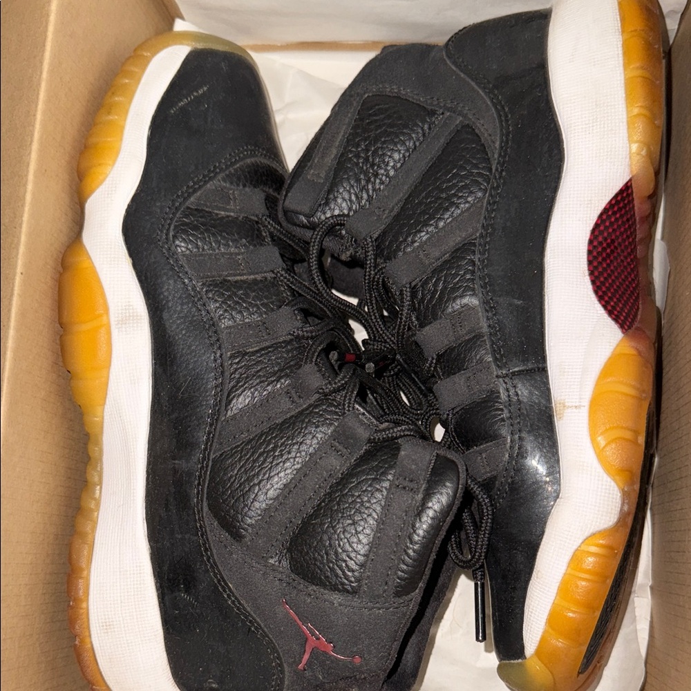 Black and White Sneakers with Red Accents